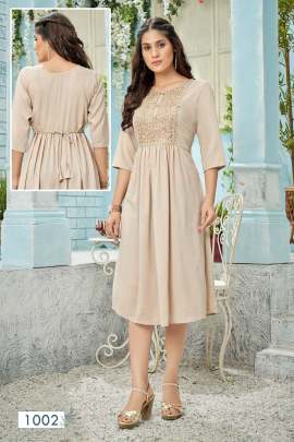 ANUSHKA - CREAM SOFT SILK SLUB KURTI WITH HEAVY EMBROIDERY AND NAYRA CUT PATTERN