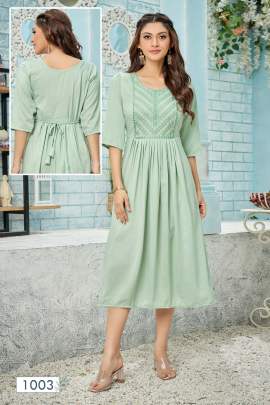 ANUSHKA - PASTEL GREEN SOFT SILK SLUB KURTI WITH HEAVY EMBROIDERY AND NAYRA CUT PATTERN