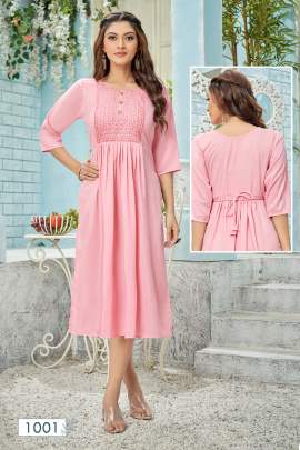 ANUSHKA - PINK SOFT SILK SLUB KURTI WITH HEAVY EMBROIDERY AND NAYRA CUT PATTERN