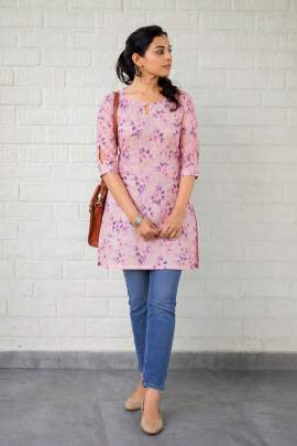 Short length kurti top for daily use with neck and sleeve pattern